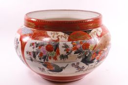 A 19th century Japanese Satsuma style planter, 19cm high, decorated with peacocks and a court scene,