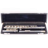 A silver plated three piece flute (cased)