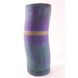 A Thomas Dare Studio pottery blue stoneware vase of a stylised bamboo form,