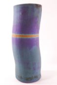 A Thomas Dare Studio pottery blue stoneware vase of a stylised bamboo form,