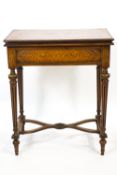 A Kingwood Louis XVI Adam Weisweiler style games table,