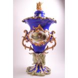 An early 19th Century Coalport style blue ground Campana form two handled urn,