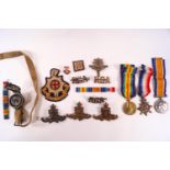 A group of assorted militaria including Three 1st World War medals to Pte Tarry (still in their