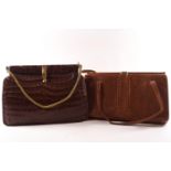 A mock crocodile ladies handbag together with a mock lizard skin ladies hand bag