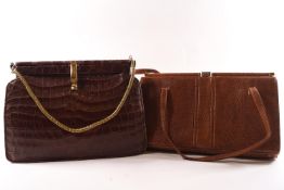 A mock crocodile ladies handbag together with a mock lizard skin ladies hand bag