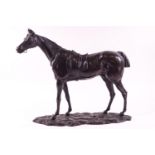 A finely cast metal study of a racehorse,