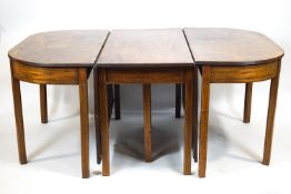 A George III mahogany three unit 'D' end dining table with inlaid satin wood and ebony stringing.