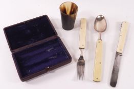 A cased campaign folding spoon and fork,