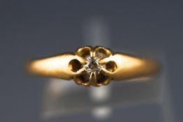 A Victorian yellow metal single stone diamond ring.