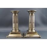A pair of EPNS low Corinthian column candlesticks,