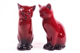 Two Royal Doulton flambe figures of seated cats,