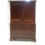 An 18th century mahogany linen press style cabinet on chest,