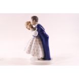 A Bing and Grondahl figure of children kissing,