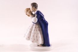 A Bing and Grondahl figure of children kissing,