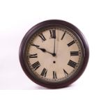 A round cased wall time piece with a plain Roman chapter dial with a framed brass set door