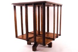 A miniature form oak revolving bookcase,