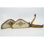 A group of three painted and gilded 'Venetian' brackets/consoles in the baroque style,