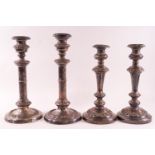 A pair of mid 19th century Sheffield plated candlesticks with bands of floral decoration,