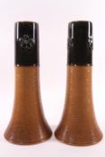 A pair of Doulton stoneware art nouveau spill vases,