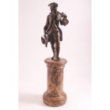 After the Antique, a bronze metal figure of a huntsman in 18th century costume,