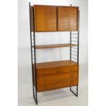 Two Robert Heal for Staples & Co, Ladderax teak modular shelving systems,