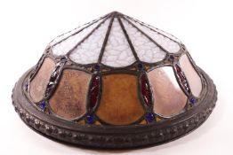 An early 20th century Art nouveau style ceiling light with stained glass and lead panels,