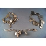 A collection of three white metal curb link chains,