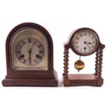 A mahogany cased dome topped clock with striking mechanism and another timepiece,