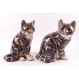 A pair of Winstanley seated ceramic tabby cats with inset glass eyes,