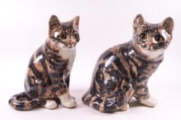 A pair of Winstanley seated ceramic tabby cats with inset glass eyes,