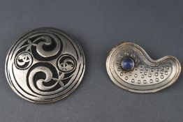 A hallmarked Swedish silver brooch set with a cabochon blue chalcedony