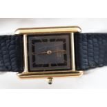 A les must de Cartier wristwatch. Rectangular dial with Roman numerals. Quartz movement.