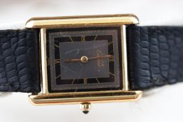 A les must de Cartier wristwatch. Rectangular dial with Roman numerals. Quartz movement.