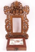 An early Cantonese boxwood rectangular pierced photograph frame, decorated with the flaming pearl,