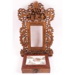 An early Cantonese boxwood rectangular pierced photograph frame, decorated with the flaming pearl,