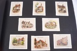An album of assorted Wills cigarette cards