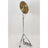 A Pulse brass percussion cymbal on a chrome stand as a lamp
