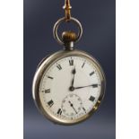 A white base metal open face pocket watch. Manual wind movement, signed Doxa.