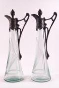 A pair of Art nouveau style vinegar bottles,