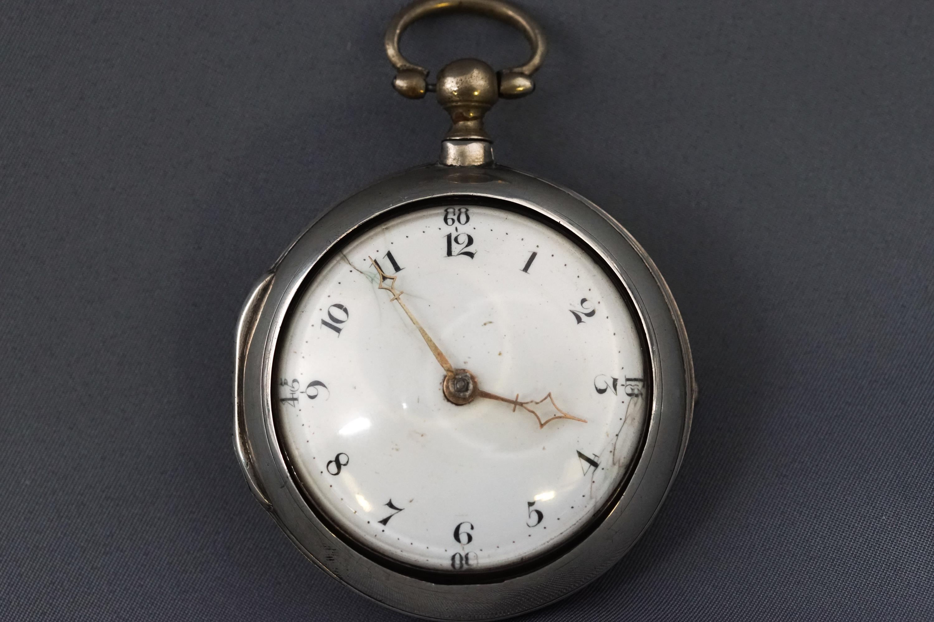 A open face key wound pocket watch with additional outer case, hallmarked sterling silver, London,