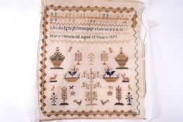 A 19th century sampler, by Mary Newland aged 13 years 1871, with alphabets, numbers....