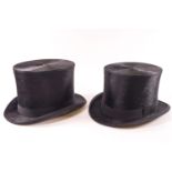Two black felt top hats, one by Christy,