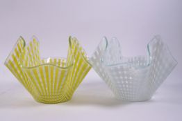 Two glass handkerchief bowls, decorated in a gingham pattern, one in yellow, one in white,
