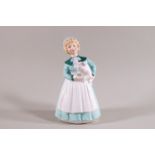 A Royal Doulton figure HN2207, with Rd 885513, Rd 36878, Rd 7803 and Rd 265/57 printed marks,