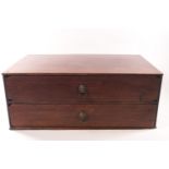 An artist's mahogany box with two drawers and set with pressed brass lion mask ring pull handles,