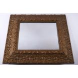 A rectangular mirror with moulded and later gold painted frame,