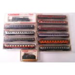 A collection of boxed Fleischmann N Gauge railway models,