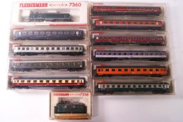 A collection of boxed Fleischmann N Gauge railway models,