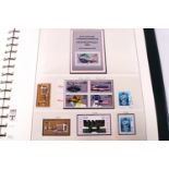 A collection of albums containing stamps from Modern and East Germany