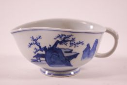 A Chinese porcelain sauce boat, painted in under glaze with figures in a landscape,